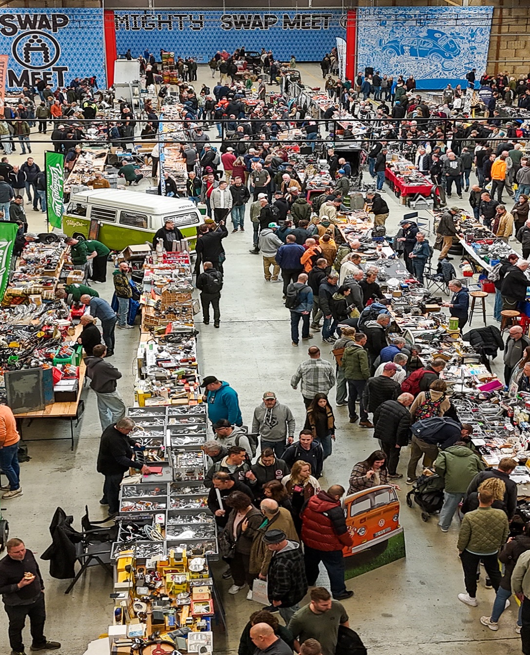 Working on my pictures of the AirMighty Swap-Meet 2026. Including some drone shots… but this I wanted to share already, just look at that Hangar nicely filled up! 😎🤙🏻 THANKS everyone for stopping by the AirMighty Swap-Meet 2026 and making it a successful 2nd edition! - www.AirMighty.com #airmighty #airmightyswapmeet #aircooledvw #vw #airmightymagazine