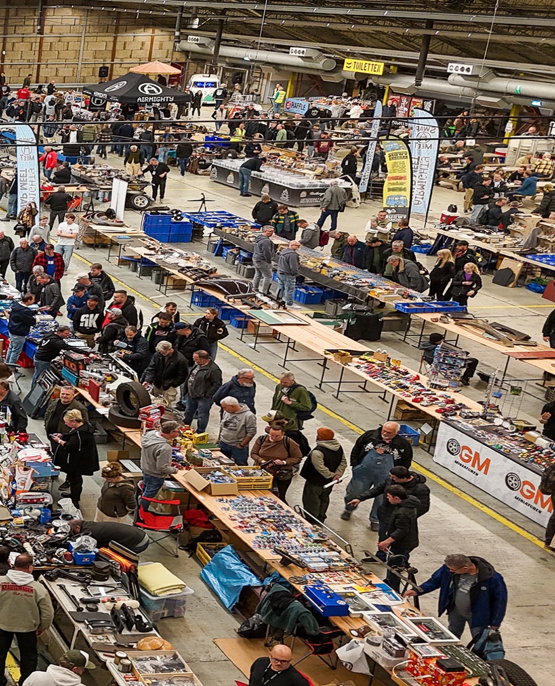 Working on my pictures of the AirMighty Swap-Meet 2026. Including some drone shots… but this I wanted to share already, just look at that Hangar nicely filled up! 😎🤙🏻 THANKS everyone for stopping by the AirMighty Swap-Meet 2026 and making it a successful 2nd edition! - www.AirMighty.com #airmighty #airmightyswapmeet #aircooledvw #vw #airmightymagazine